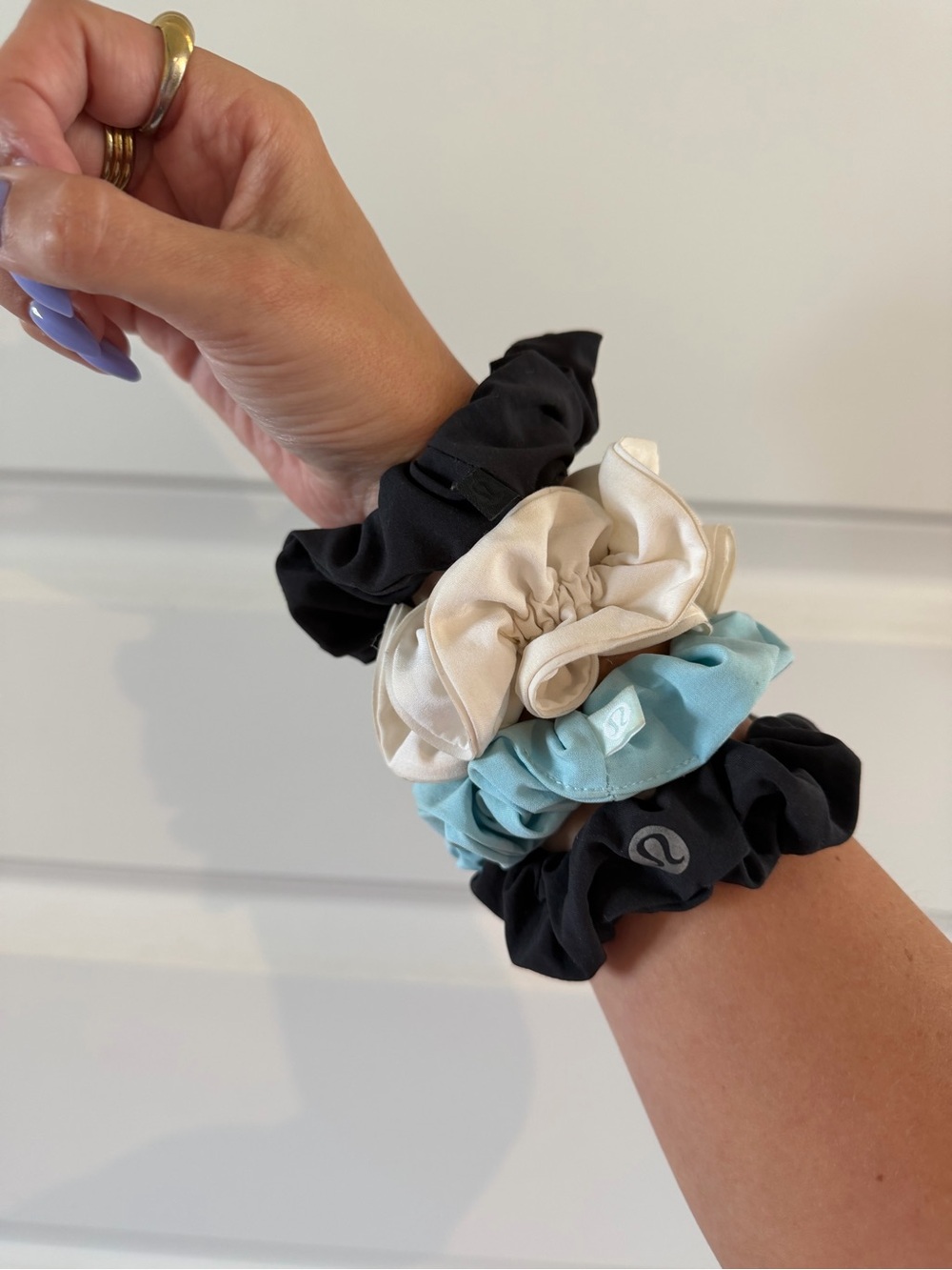 lululemon athletica Black, White & Light Blue Scrunchies. 4 pack.
